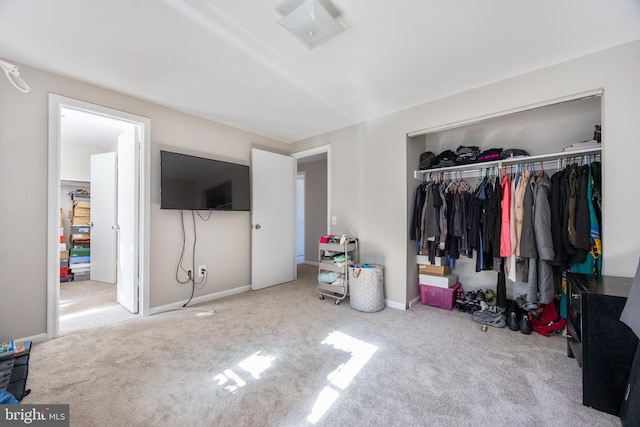 carpeted bedroom featuring a closet