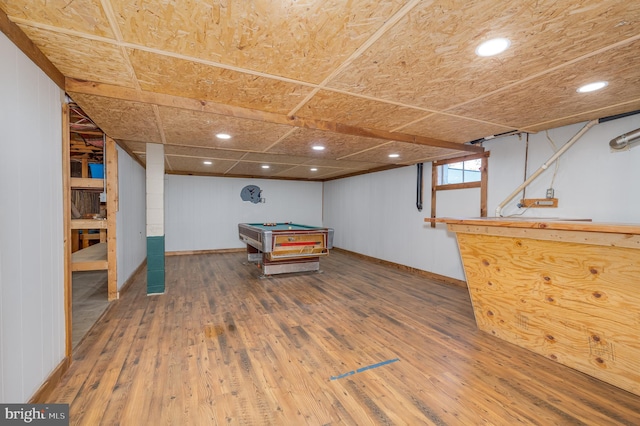 playroom with wooden walls, wood-type flooring, and billiards