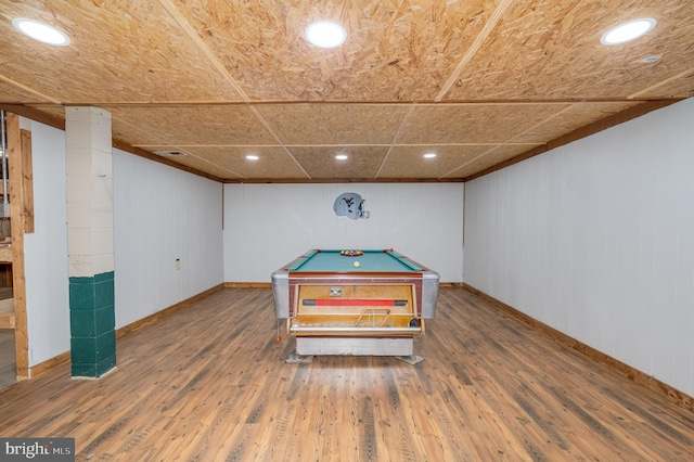 playroom with wooden walls, wood-type flooring, and billiards