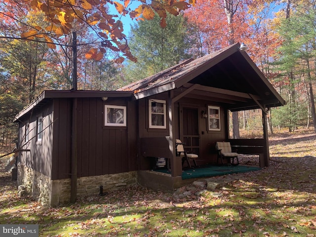 view of home's exterior featuring covered porch