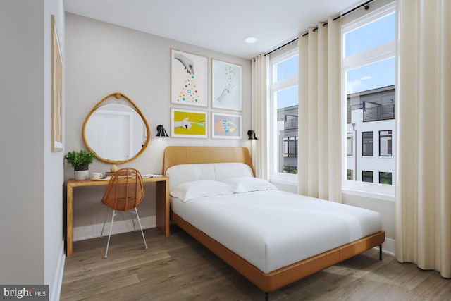 bedroom featuring dark hardwood / wood-style flooring