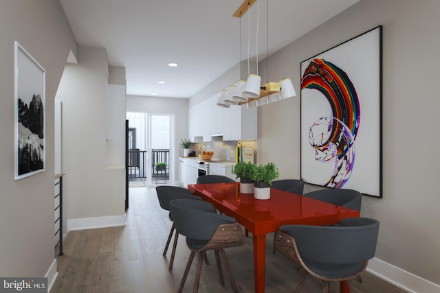 dining room with wood-type flooring