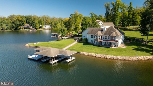 drone / aerial view with a water view