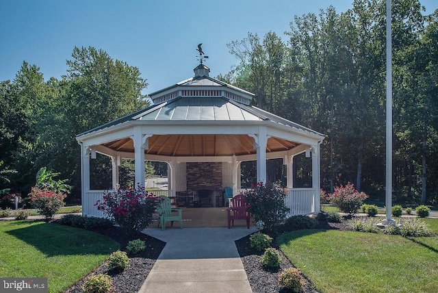 surrounding community with a gazebo and a lawn