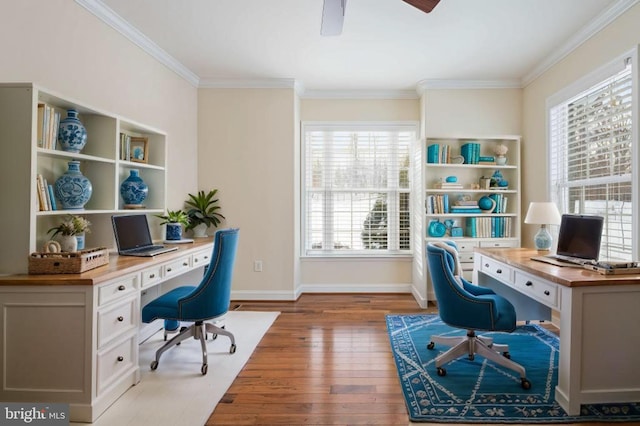 office area featuring wood-type flooring, ceiling fan, and crown molding