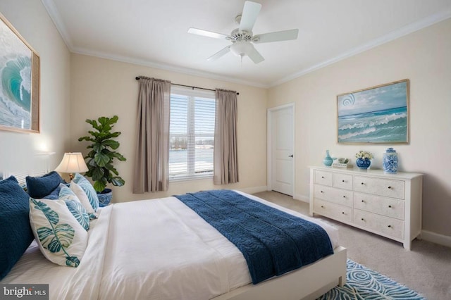 bedroom featuring light colored carpet, ceiling fan, and crown molding