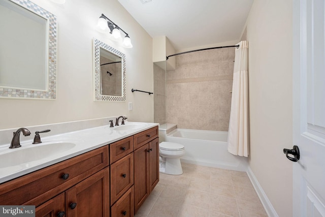 full bathroom with tile patterned flooring, shower / bath combo, toilet, and vanity