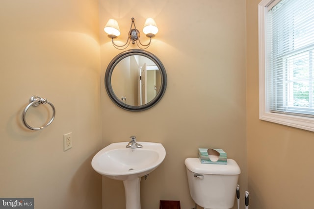 bathroom with sink and toilet