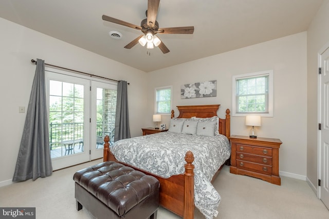 428 Pinnacle Dr, Swanton, MD 21561 - carpeted bedroom with access to exterior, visible vents, multiple windows, and baseboards