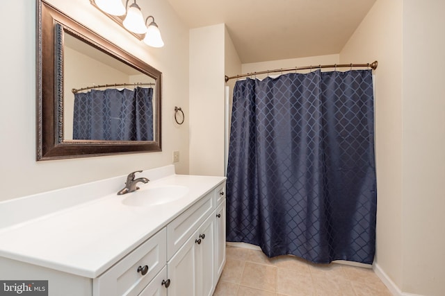 bathroom featuring vanity and tile patterned flooring