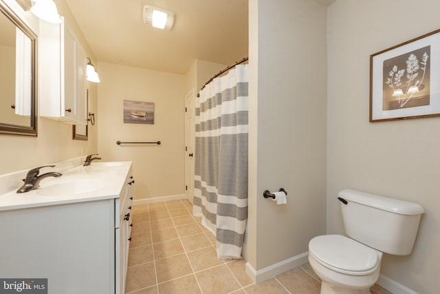 bathroom with vanity, a shower with shower curtain, toilet, and tile patterned flooring