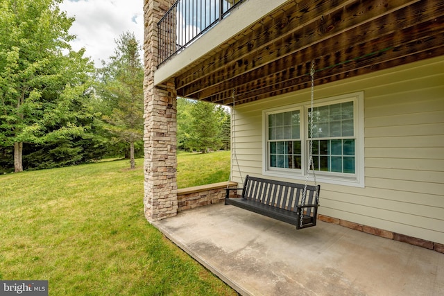 view of patio / terrace with a balcony