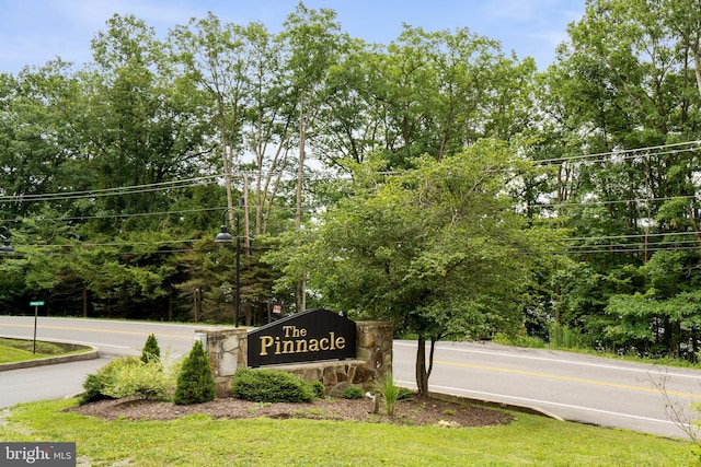 view of community sign