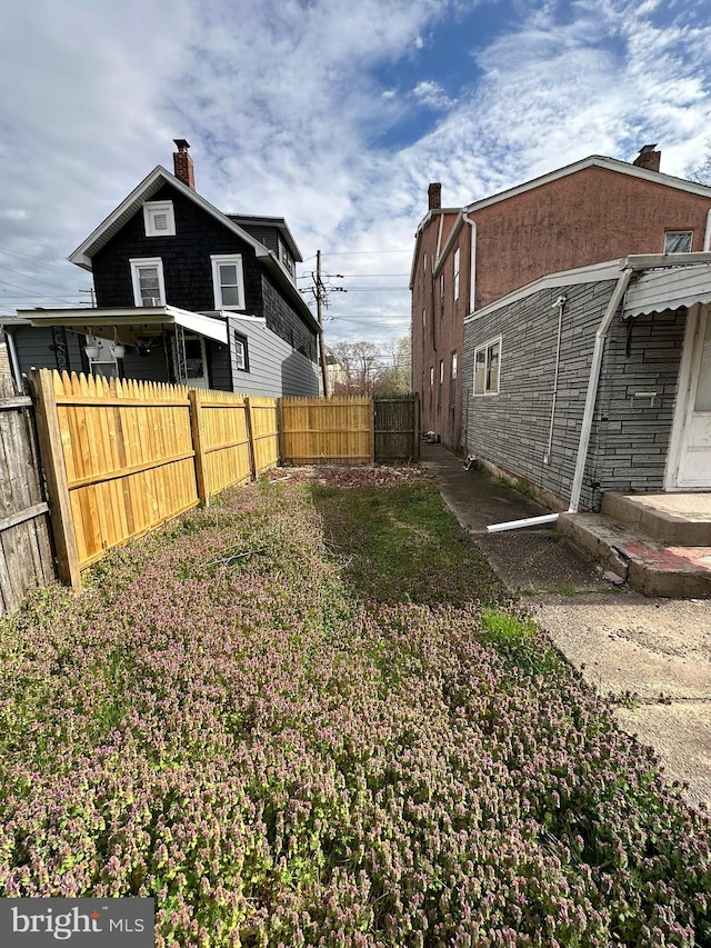 view of yard with fence