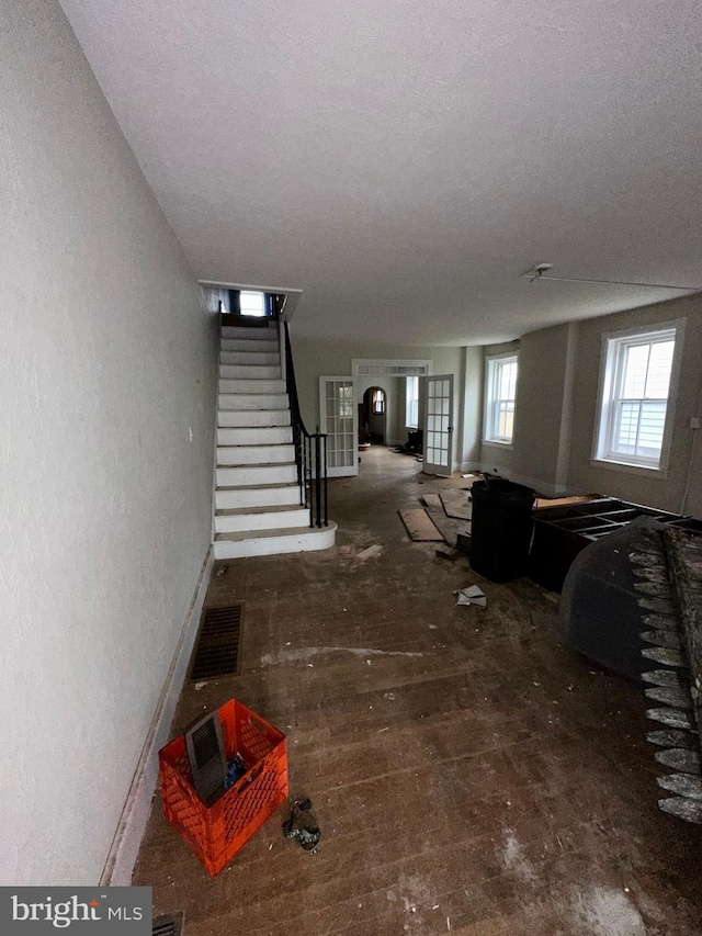 basement featuring a textured ceiling