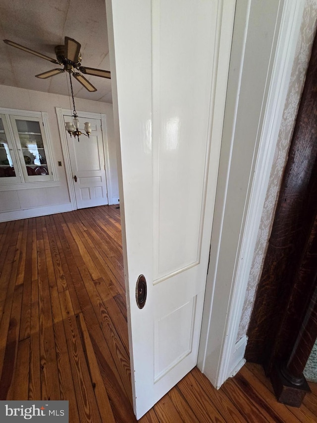 corridor featuring hardwood / wood-style flooring