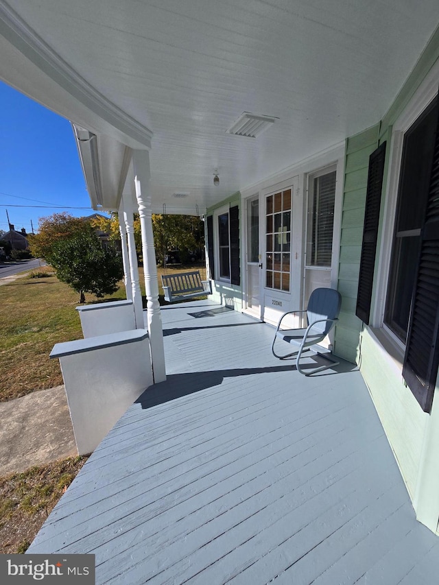 exterior space featuring covered porch