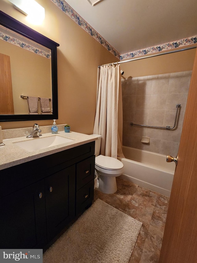 full bathroom featuring vanity, shower / tub combo with curtain, and toilet