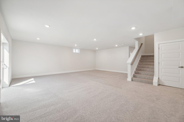 basement with light colored carpet