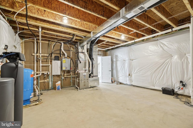 basement featuring heating unit