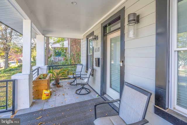 exterior space featuring covered porch