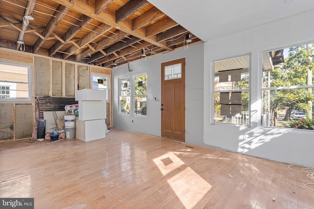 interior space with hardwood / wood-style flooring