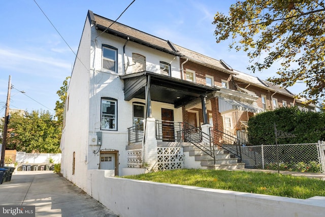 5317 9th St NW, Washington, DC 20011 - multi unit property with fence, covered porch, and brick siding