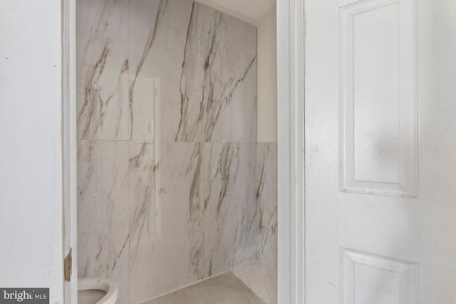 bathroom featuring toilet