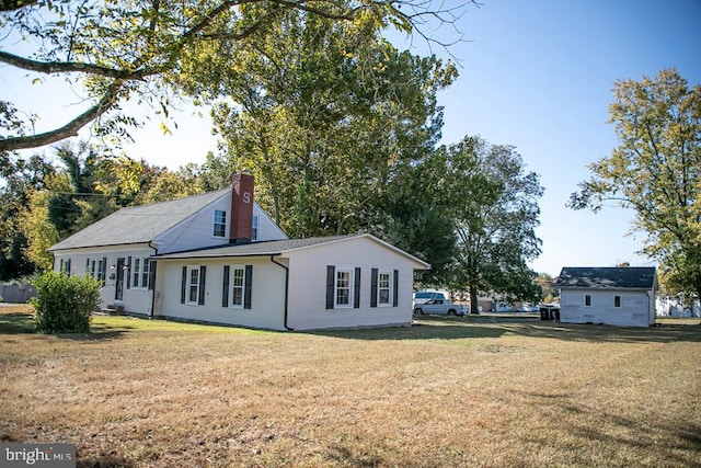 view of home's exterior featuring a yard