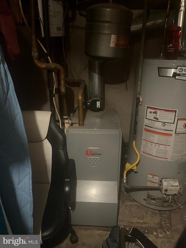 utility room featuring gas water heater