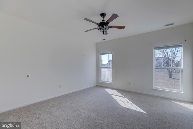 carpeted empty room with ceiling fan