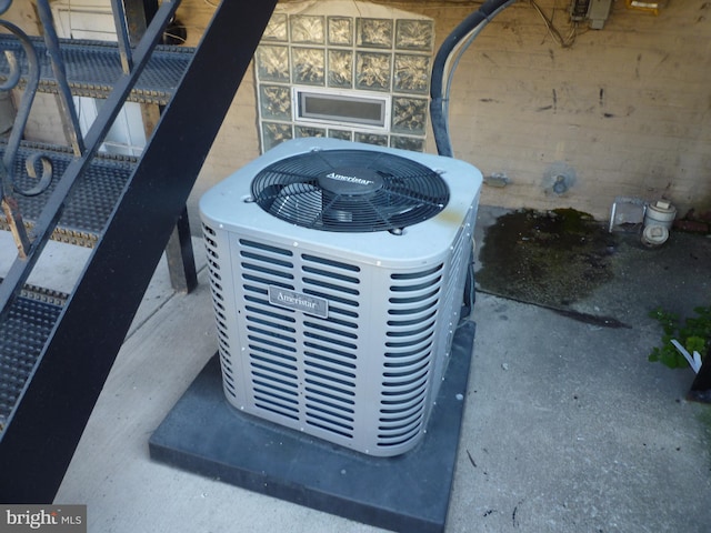 exterior details featuring concrete floors and central AC unit