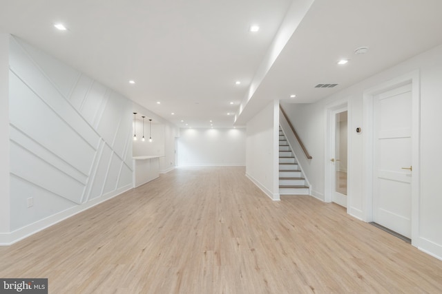 interior space with light hardwood / wood-style flooring