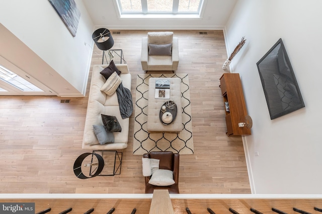 unfurnished living room with hardwood / wood-style floors