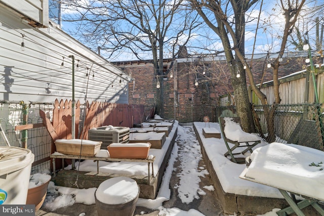 view of snow covered patio