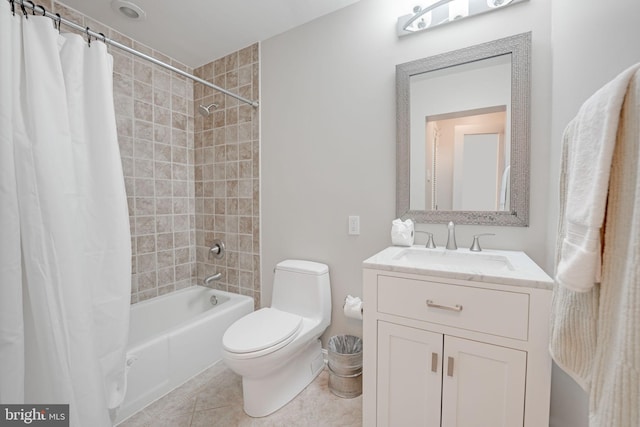 bathroom featuring toilet, shower / bathtub combination with curtain, vanity, and tile patterned floors