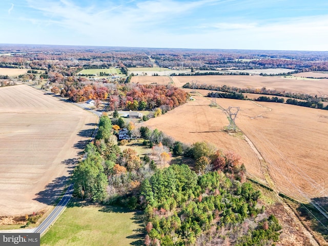 birds eye view of property featuring a rural view