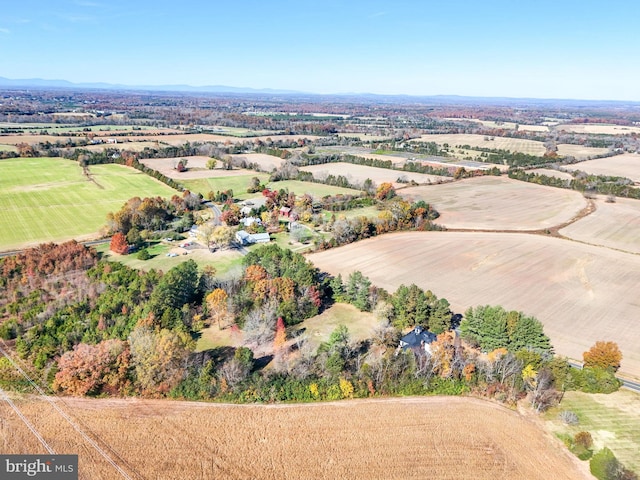 birds eye view of property featuring a rural view