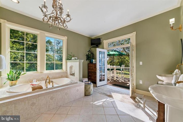 bathroom featuring tile patterned flooring, a relaxing tiled tub, a notable chandelier, and ornamental molding