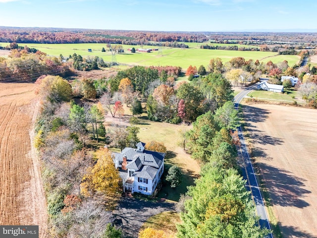 birds eye view of property featuring a rural view