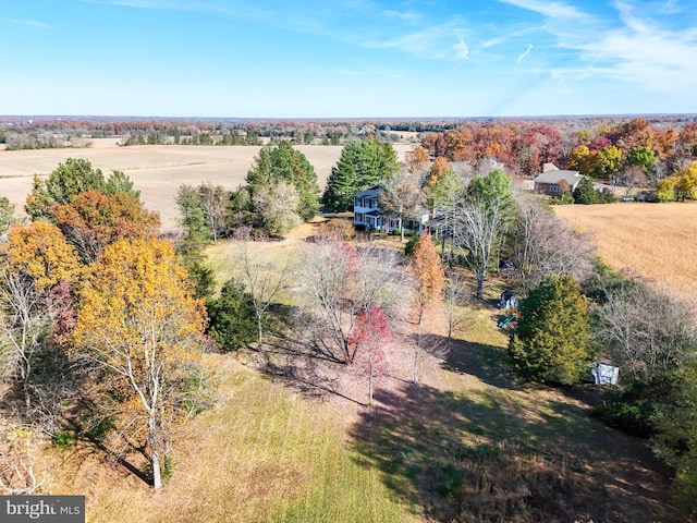 birds eye view of property featuring a rural view