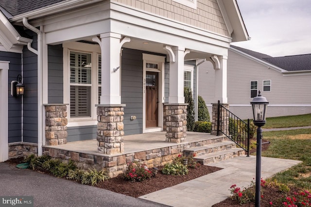 entrance to property with covered porch