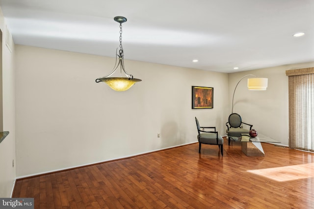 living area featuring hardwood / wood-style floors