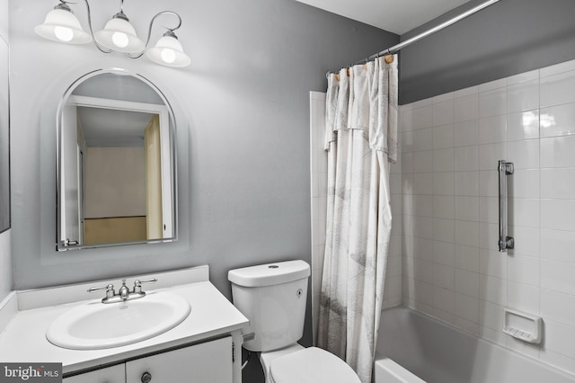 full bathroom featuring shower / bathtub combination with curtain, vanity, and toilet