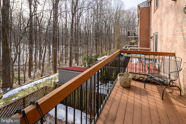 view of snow covered deck