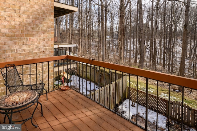 view of snow covered deck