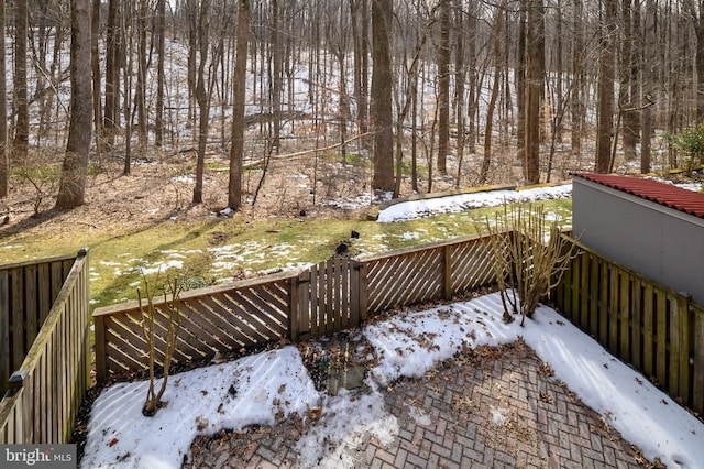 view of snow covered deck