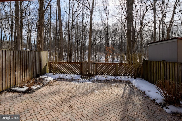 view of snow covered patio