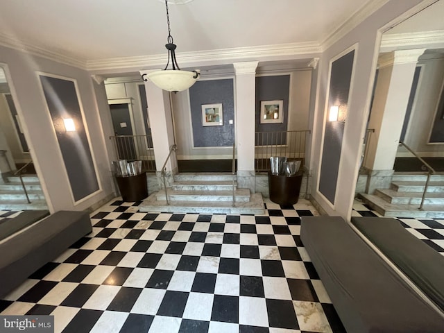 interior space featuring crown molding and decorative columns