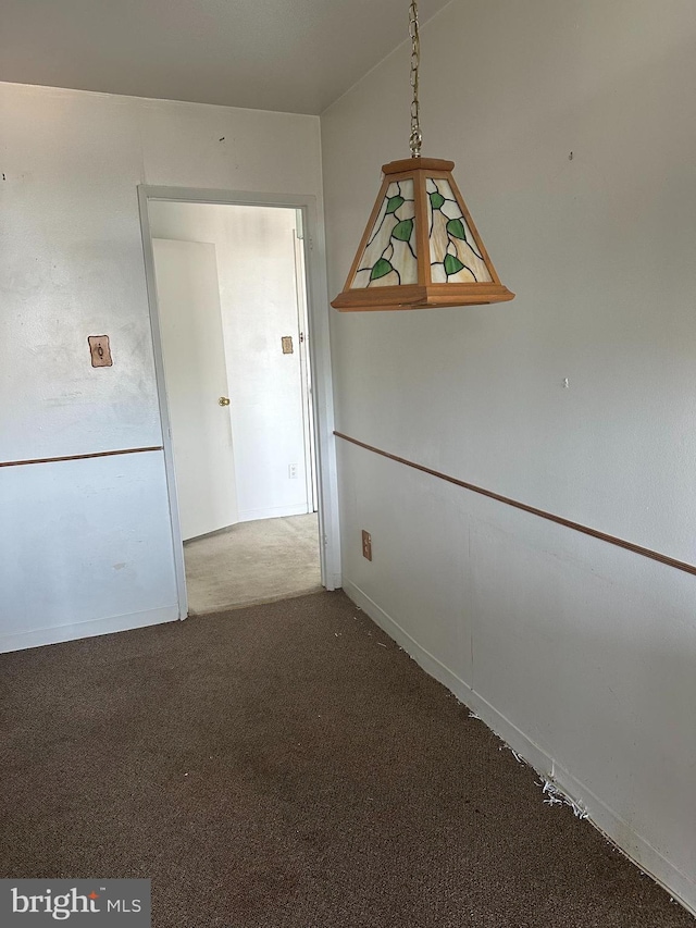 hallway with carpet flooring